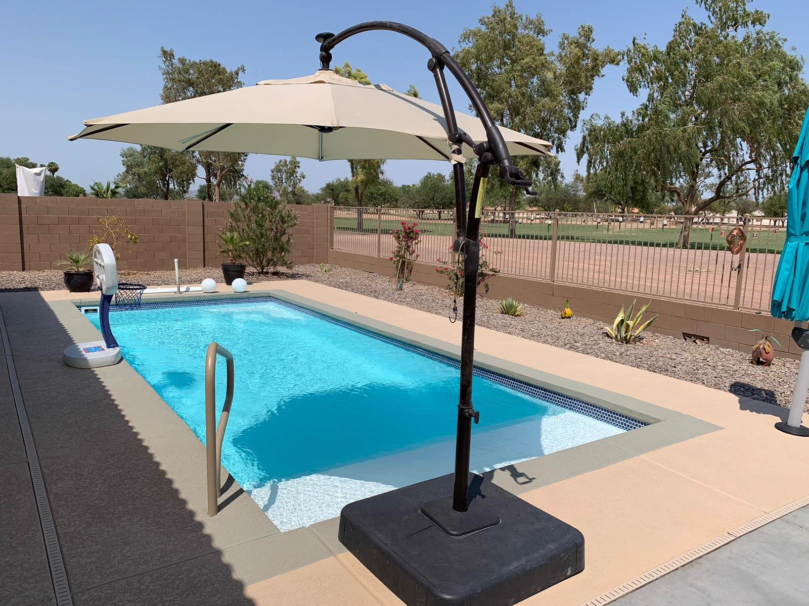 Clean fiberglass pool with clear water