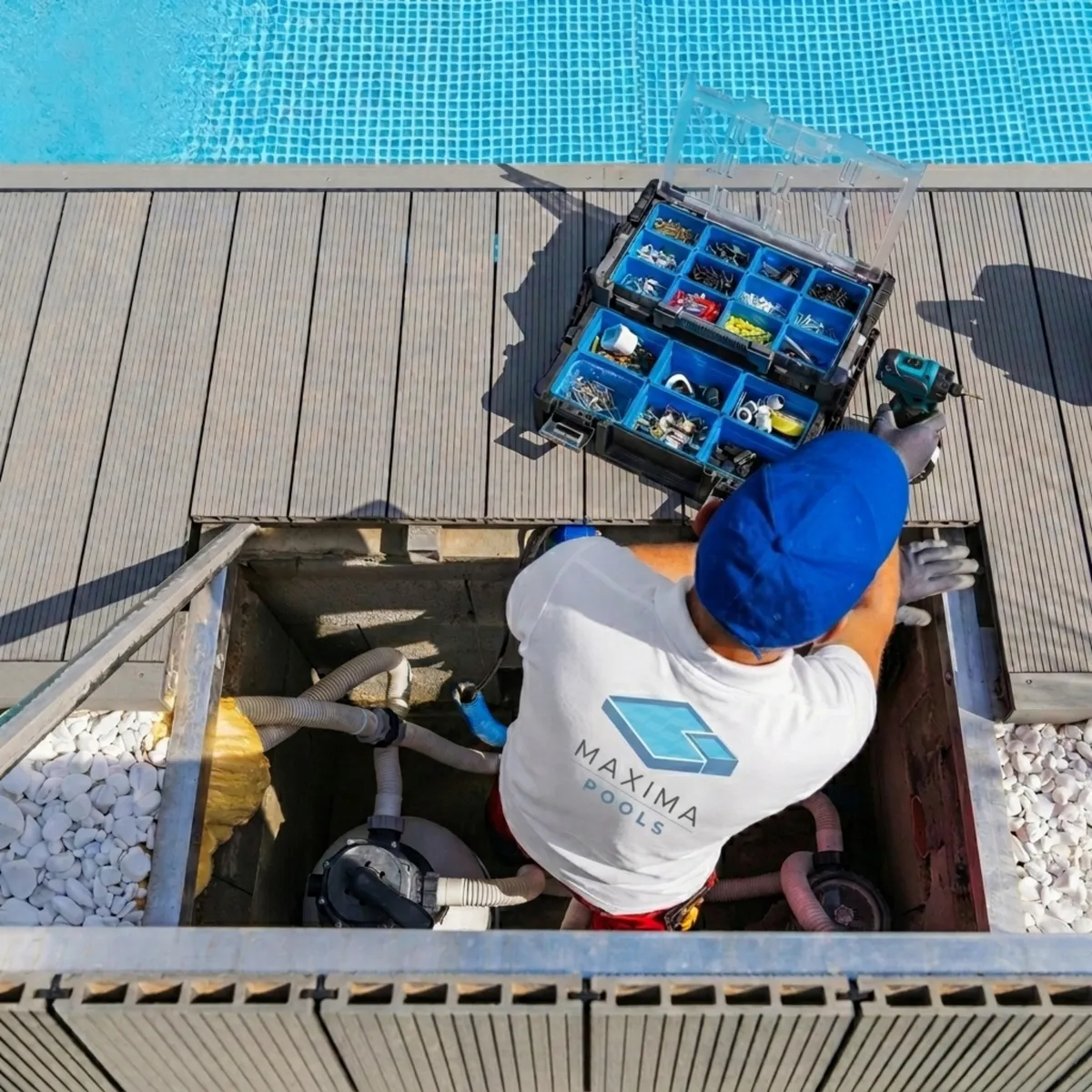 Maxima technician servicing pool equipment